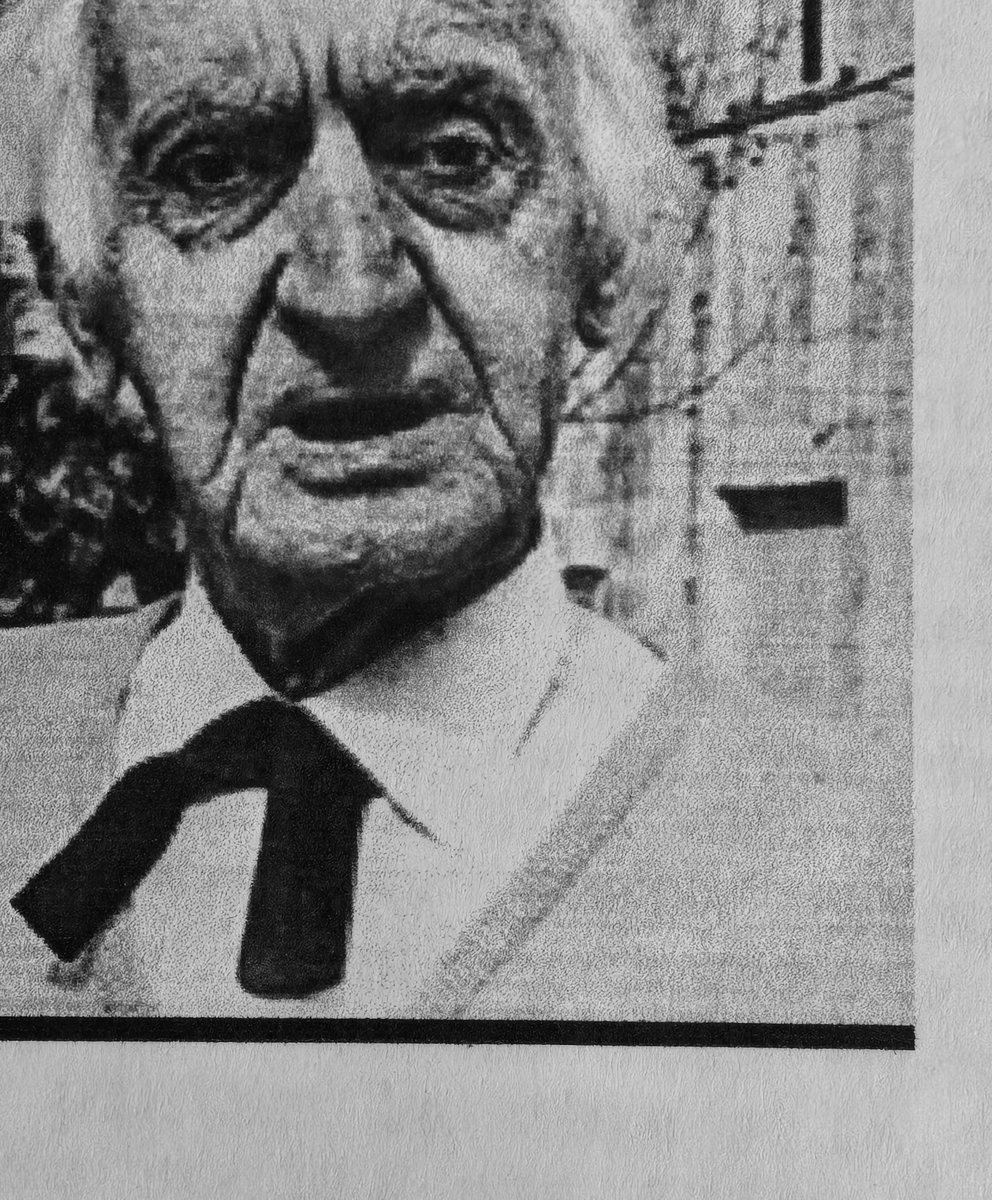 Retrato fotográfico de Elías Castelnuovo ya anciano, de traje y corbata oscura, mirando a cámara.